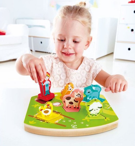 Puzzle en bois à encastrer pour les enfants. Puzzle à bouton ou